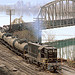 Pittsburgh and Lake Erie local freight, powered by 1500 hp EMD GP-7 5733, leaving Neville Island, and entering McKees Rocks, PA, after crossing the back channel of the Ohio River, October, 1971